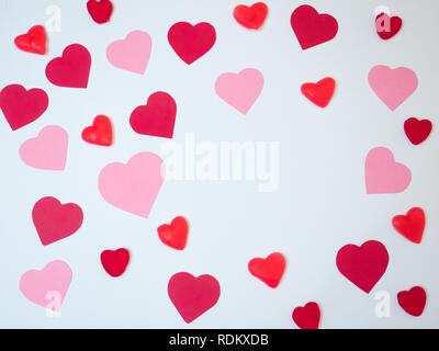 San Valentine´s day decoration card made with red and pink paper hearts. Gift card. Stock Photo