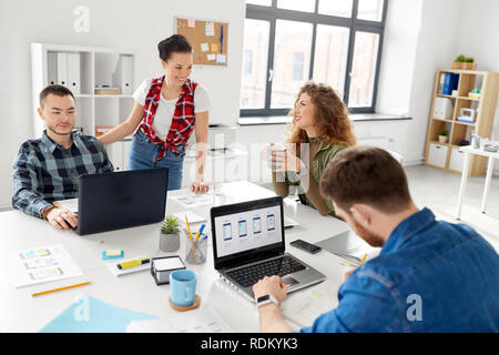 creative team working on user interface at office Stock Photo