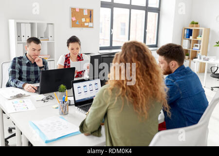 creative team working on user interface at office Stock Photo