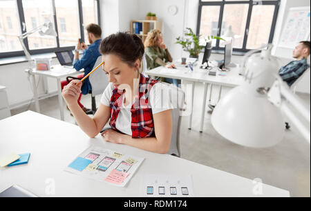 creative woman working on user interface at office Stock Photo