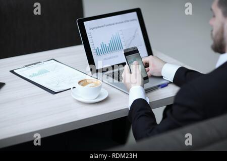 businessman working with new start up project using smart phone Stock Photo