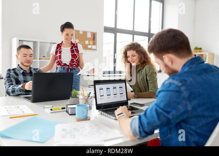 creative team working on user interface at office Stock Photo