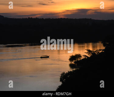 Boat at sunset on the Nile River in Jinja, Uganda Stock Photo