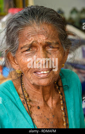 Elderly Indian woman in Conemara market, Trivandrum, Kerala, India Stock Photo