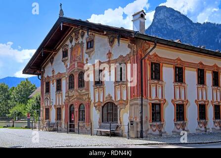 Pilatus house with typical Lüftlmalerei in the center with the Kofel 1342m, Oberammergau, Passion play village, Ammertal Stock Photo