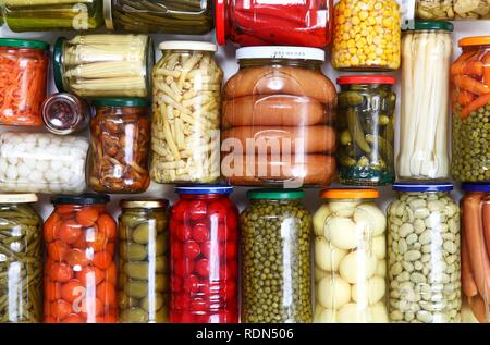Food conserved in glass packaging Stock Photo