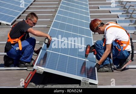 Construction of a large photovoltaic system on several rooftops, 16000 square metres, Gelsenkirchen, North Rhine-Westphalia Stock Photo