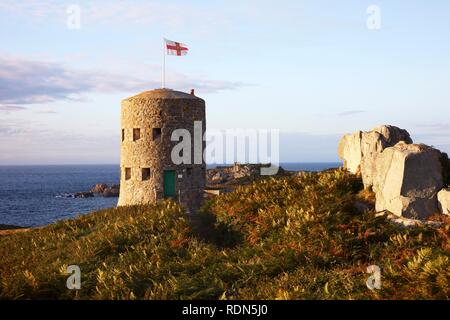 Martello towers, watch towers and fortified towers built in the 17th century, situated along the coastline, here number 5 at Stock Photo