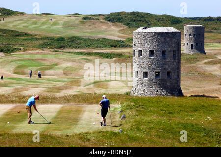 Royal Guernsey Golf Club, Martello towers, watch towers and fortified towers built in the 17th century, next to the fairways, at Stock Photo