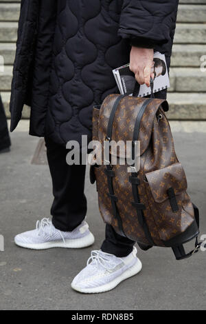 MILAN - JUNE 18: Man with Louis Vuitton brown backpack before Giorgio  Armani fashion show, Milan Fashion Week street style on June 18, 2018 in  Milan Stock Photo - Alamy