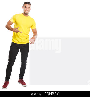Young man showing pointing copyspace marketing ad advert empty blank sign isolated on a white background Stock Photo