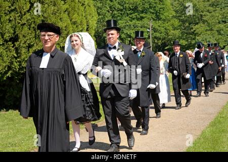 Members of the local costume group Rubisko re-enacting a traditional wedding procession, Luebbenau, Spreewald, Brandenburg Stock Photo