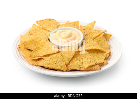 Dish of nacho chips and dip sauce isolated on white Stock Photo