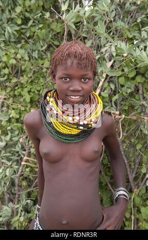 Nyangatom, Bume or Buma girl with bead necklaces, Omo Valley, Ethiopia, Africa Stock Photo