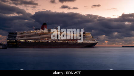 Cruise ship and an amazing sunset Stock Photo