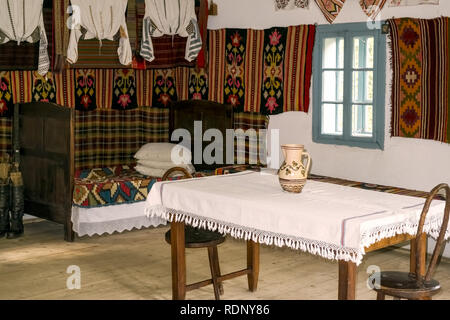 Bucharest, Romania, September 13, 2017. Dimitrie Gusti National Village Museum. Traditional Romanian folk house interior with vintage decoration. Stock Photo