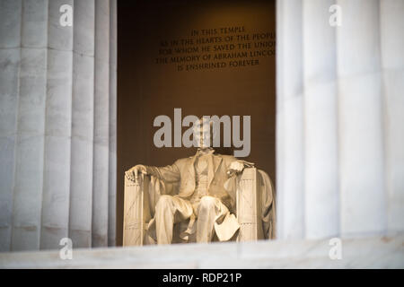 WASHINGTON DC, United States — The Lincoln Memorial Statue, situated within the Lincoln Memorial in Washington, DC, United States, is a remarkable work of art and an important symbol of American history. Created by renowned sculptor Daniel Chester French, this iconic marble statue represents Abraham Lincoln, the 16th President of the United States, who played a pivotal role in preserving the nation during the tumultuous period of the Civil War. Stock Photo