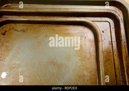 old stained baking trays Stock Photo