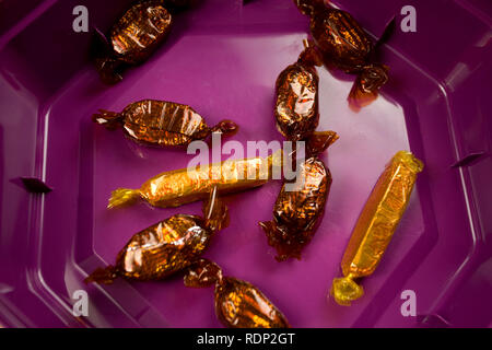 Almost empty tin of Quality Street Chocolates Stock Photo