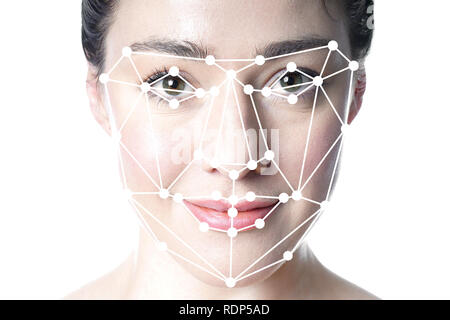 face detection or facial recognition grid overlay on face of woman Stock Photo