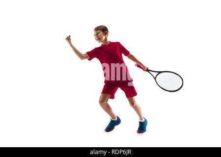 Young teen boy tennis player in motion or movement isolated on white studio background. The sport, exercise, training concept Stock Photo