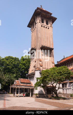 South facade of the Cua Bac church (Vietnamese: Nhà thờ Cửa Bắc) with the tall bell tower, Hanoi, Vietnam Stock Photo