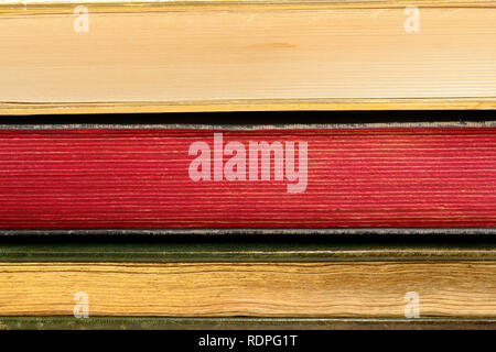 the edges of three old books, horizontal Stock Photo