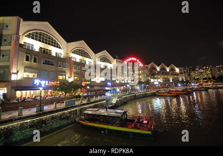 People visit Clarke Quay riverside Point shopping mall Singapore Stock Photo