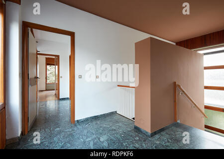 Corridor and staircase with green marble floor in country house Stock Photo