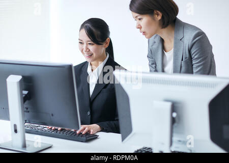 Young Japanese businesspeople Stock Photo