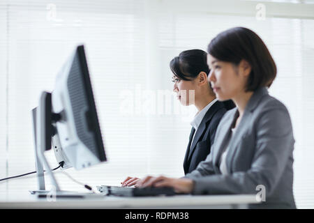 Young Japanese businesspeople Stock Photo