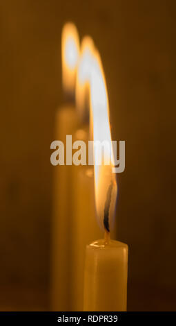 Candles of prayers in one of the oldest churches in Egypt,group of votive candle wax Stock Photo