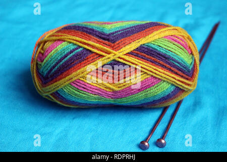 Colourful Ball of Wool with Knitting Needles Stock Photo
