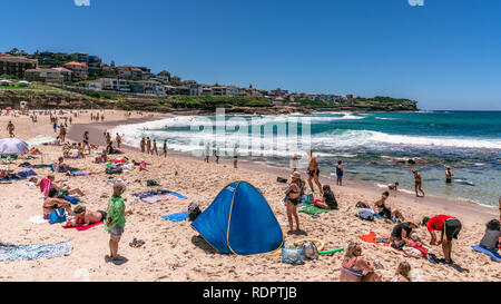 24th December 2018, Bronte Sydney Australia: people and families with beach tent enjoying hot sunny summer day on Bronte beach in Sydney NSW Australia Stock Photo