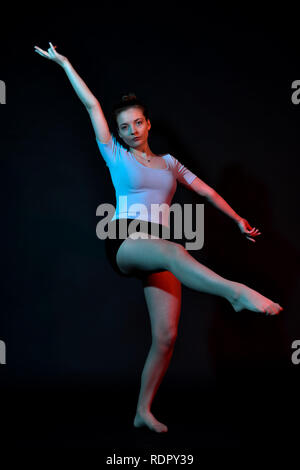 dancing female in clothing that defines her persona Stock Photo