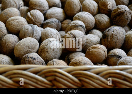 Nuts in basket theme Stock Photo