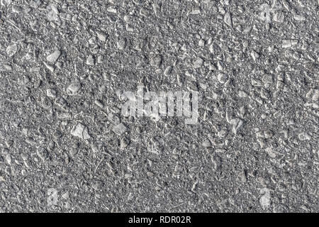 The texture of gray asphalt close-up as background. Stock Photo