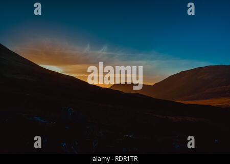 Sunset over the Isle of Skye hills Stock Photo