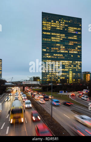 München, Munich: highway Mittlerer Ring (Middle Ring), traffic jam, office buildings Highlight Towers (right) in Oberbayern, München, Upper Bavaria, B Stock Photo