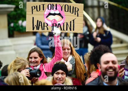 London, UK. 19th Jan, 2019. A girl carries a sign during the Women's March in the capital, one of 30 such worldwide marches protesting against violence against women and the negative impact of austerity policies. London's theme this year is 'Bread and Roses', honouring Polish-American suffragette Rose Schneiderman who, in 1911 said 'The worker must have bread but she must have roses too', in response to a factory fire where 146 mainly female garment workers died. Credit: Stephen Chung/Alamy Live News Stock Photo