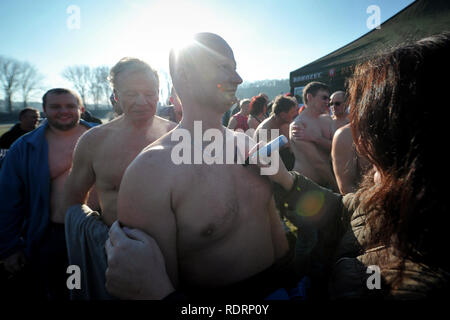 Mlada Boleslav, Czech Republic. 19th Jan, 2019. Polar swimmers take part in the traditional swim in the Jizera River in Mlada Boleslav 50 kilometers north of Prague in the Czech Republic. About two hundred swimmers took part in water temperatures of 4 degrees Celsius. Credit: Slavek Ruta/ZUMA Wire/Alamy Live News Stock Photo