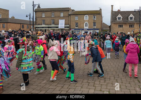 Whittlesey, Cambridgeshire, UK. 19th Jan, 2019. Whittlesey is hosting the 40th The Straw Bear Festival procession on January 19, 2018. The  festival celebrates the old Fenland plough custom of parading straw bears around the town every January where they would then consume beer tobacco and beef.  The procession, led by the Straw Bear, has over 2o0 dancers, musicians and performers. They perform traditional Molly, Morris, Clog and Sword dancing. There are concerts planned for the evenings Credit: WansfordPhoto/Alamy Live News Stock Photo
