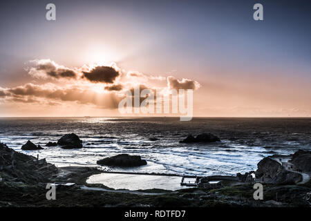 Rays of light illuminating the Lands End bay, San Francisco, California Stock Photo