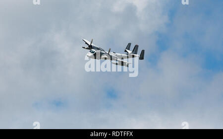 Grumman OV-1 Mohawk a twin turboprop US Army observation and surveillanceaircraft used in Vietnam War flying in a air show Stock Photo