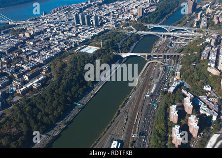 Harlem river. Bridges between Manhattan and the Bronx in New York NYC in USA. Upper Manhattan. Aerial helicopter view Stock Photo