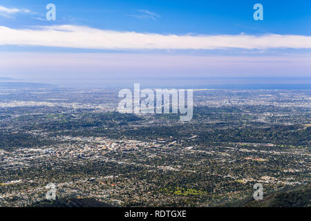 Panoramic aerial view of Los Angeles downtown and the metropolitan area surrounding it; Pasadena in the foreground; Santa Monica and the Pacific Ocean Stock Photo