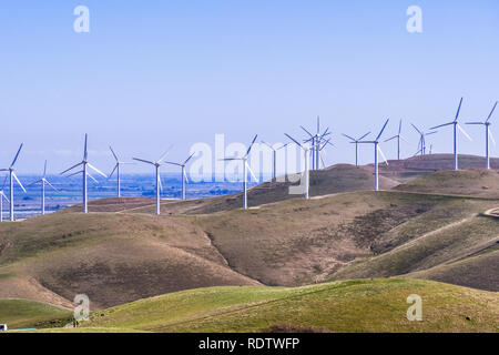 Wind turbines on the hills of east San Francisco bay, Stockton valley in the background, Alameda county, California Stock Photo