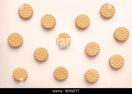 Cookies biscuits crackers flat lay on beige background, top view. Stock Photo