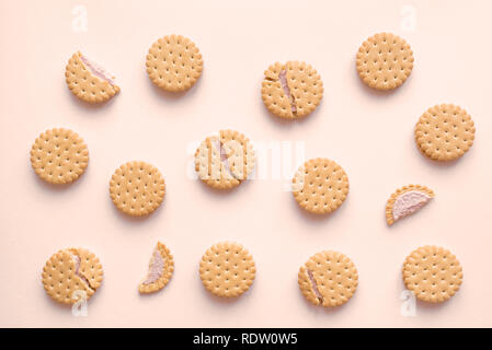 Cookies biscuits crackers flat lay on beige background, top view. Stock Photo