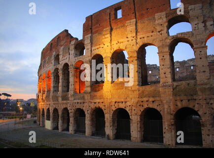 The iconic ancient Colosseum of Rome. View in sunrise . Stock Photo